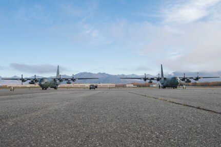 A Republic of Korea Air Force C-130 Hercules assigned to the 5th Air Mobility Wing and a ROKAF C-130 assigned to the 15th Special Missions Wing sit on the flight line during Red Flag-Alaska 18-4 at Joint Base Elmendorf-Richardson, Alaska, Oct. 1, 2018. Red Flag-Alaska is a Pacific Air Forces-directed field training exercise for U.S. and international forces flown under simulated air combat conditions. The exercises are focused on improving the combat readiness of U.S. and international forces and providing training for units preparing for air expeditionary force taskings.