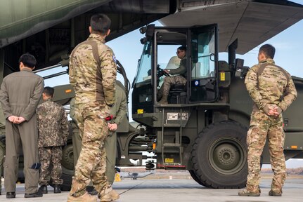 .S. Air Force Senior Airman Thomas Scholtz, a ground transportation vehicle operator with the 35th Logistics Readiness Squadron, Misawa Air Base, Japan, operates a 10k all-terrain forklift to unload cargo from a Republic of Korea Air Force C-130 Hercules during Red Flag-Alaska 18-4 at Joint Base Elmendorf-Richardson, Alaska, Oct. 1, 2018. Red Flag-Alaska is a Pacific Air Forces-directed field training exercise for U.S. and international forces flown under simulated air combat conditions. The exercises are focused on improving the combat readiness of U.S. and international forces and providing training for units preparing for air expeditionary force taskings.