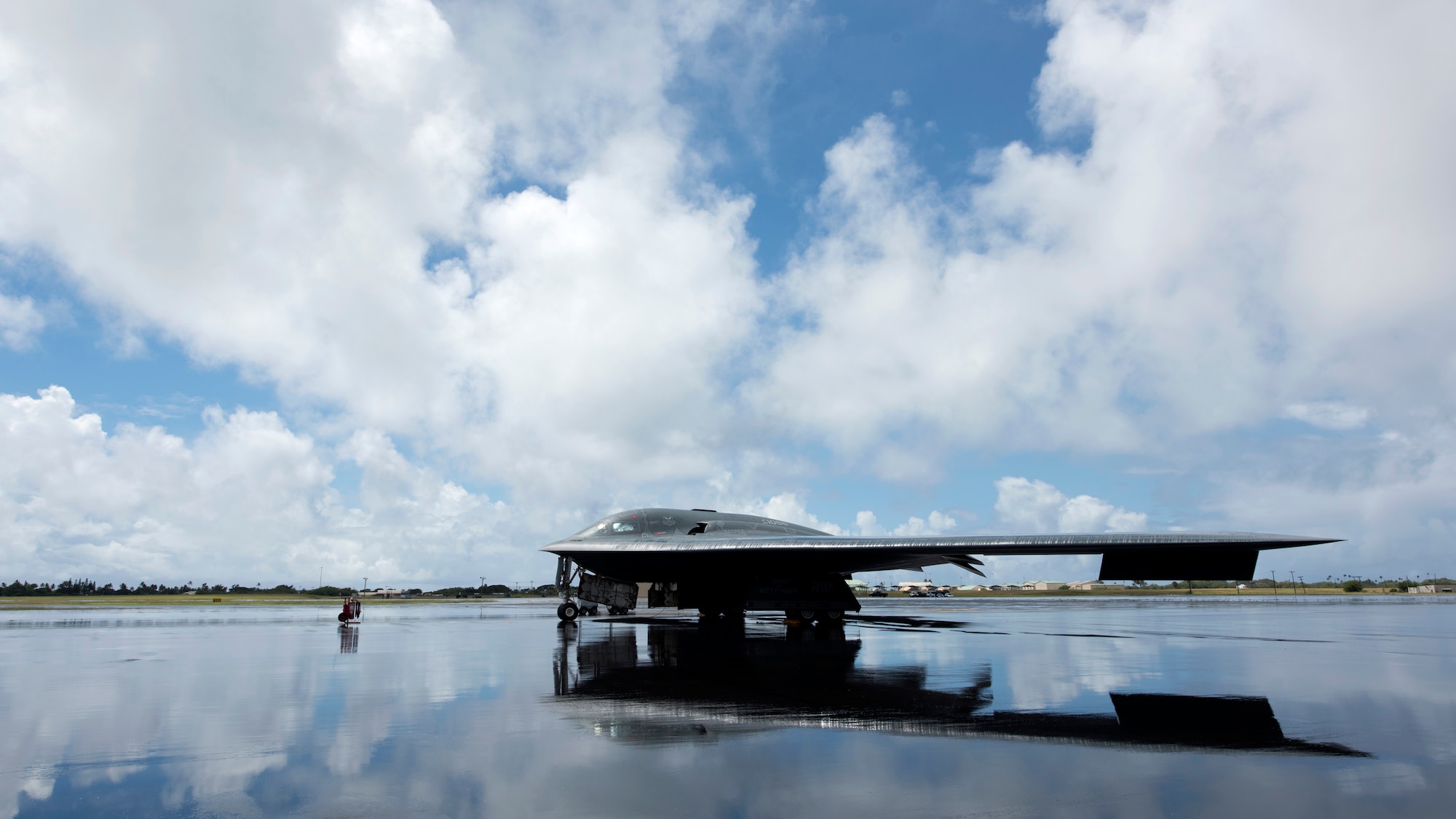 A U.S. Air Force B-2 Spirit deployed from Whiteman Air Force Base, Missouri, to Joint Base Pearl Harbor-Hickam, Hawaii, in support of the U.S. Strategic Command’s Bomber Task Force deployment is parked on the flightline Sept. 26, 2018. The B-2 is a multi-role bomber with a wingspan of 172 feet capable of delivering both conventional and nuclear munitions. (U.S. Air Force photo by Staff Sgt. Danielle Quilla)