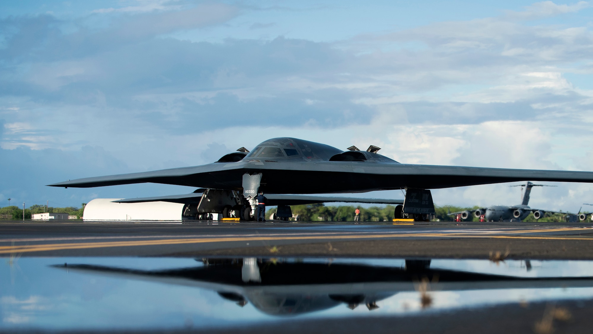 A U.S. Air Force B-2 Spirit deployed from Whiteman Air Force Base, Missouri, to Joint Base Pearl Harbor-Hickam, Hawaii, in support of the U.S. Strategic Command’s Bomber Task Force deployment is parked on the flightline Sept. 26, 2018. The B-2 is a multi-role bomber with a wingspan of 172 feet capable of delivering both conventional and nuclear munitions. (U.S. Air Force photo by Staff Sgt. Danielle Quilla)