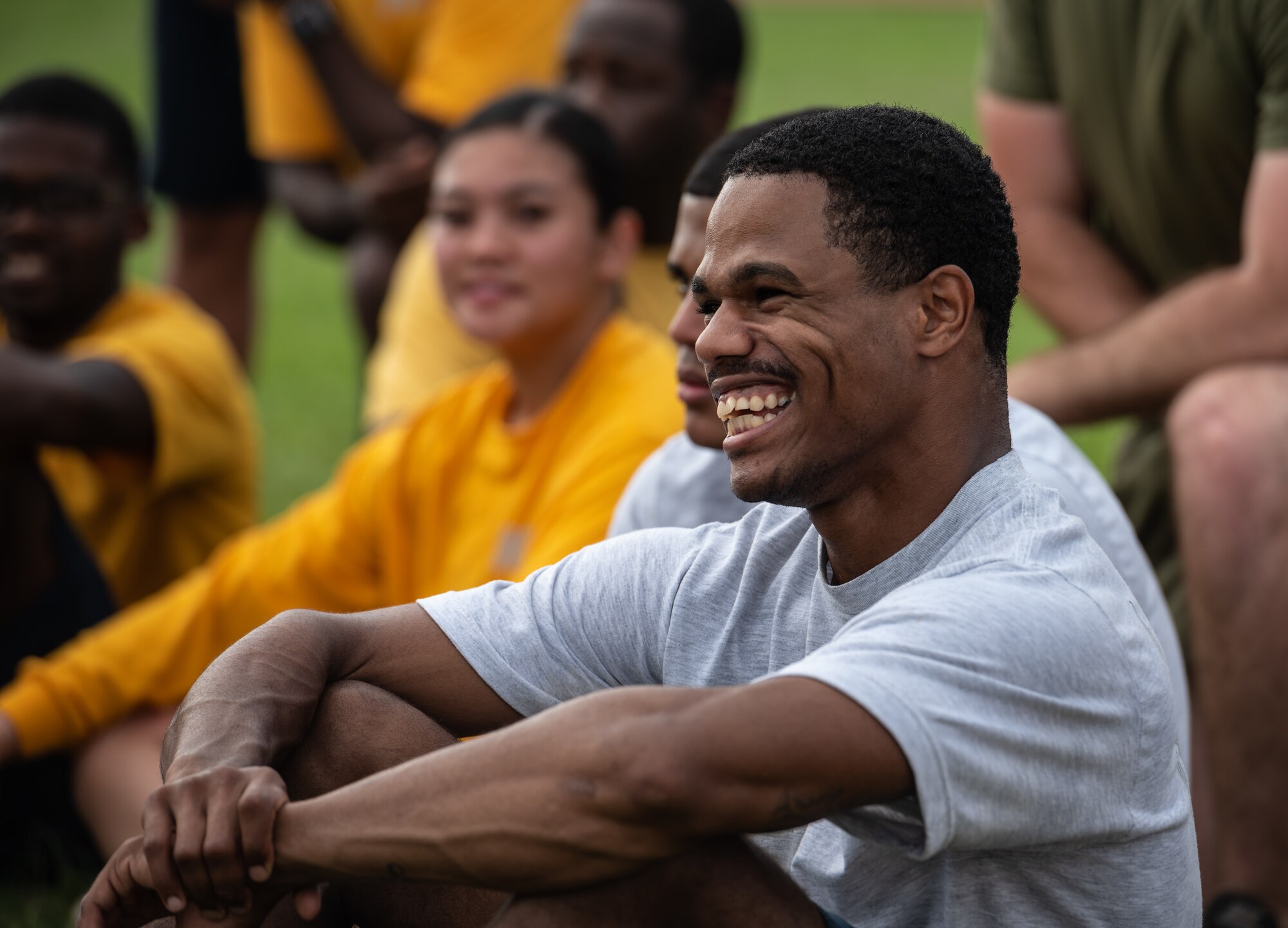 U.S. Air Force Staff Sgt. Amann Davis, Okinawa Joint Experience Red Team student, smiles after completing the Okinawa Joint Fitness Challenge Sept. 26, 2018, at Kadena Air Base, Japan. The OJFC was a portion of the OJE that enabled students to bond while overcoming obstacles and challenges faced in the battlefield. (U.S. Air Force photo by Staff Sgt. Micaiah Anthony)