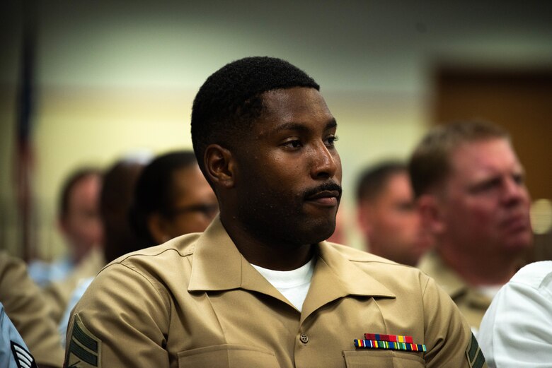 U.S. Marine Corps Cpl. Kyle Deadrick, Okinawa Joint Experience Green Team student, listens during the Okinawa Joint Experience Sept. 27, 2018, at Kadena Air Base, Japan. OJE was a three-day course aimed at improving relationships and familiarizing service members, from different branches of service, with each other. (U.S. Air Force photo by Senior Airman Kristan Campbell)