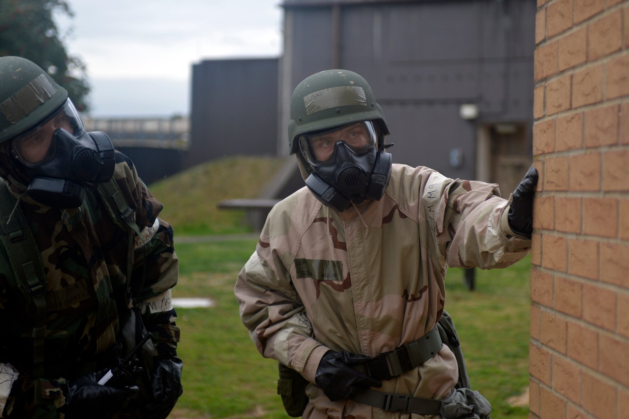 48th Fighter Wing Airmen conduct post-attack reconnaissance during a readiness exercise at Royal Air Force Lakenheath, England, Oct. 2, 2018. Exercise training emphasized a broad spectrum of elements from pre-attack preparedness, command and control, and protection of assets and personnel, to self-aid buddy care for wounded wingmen. (U.S. Air Force photo by Master Sgt. Eric Burks) (Portions of this image have been obscured to protect operational security)