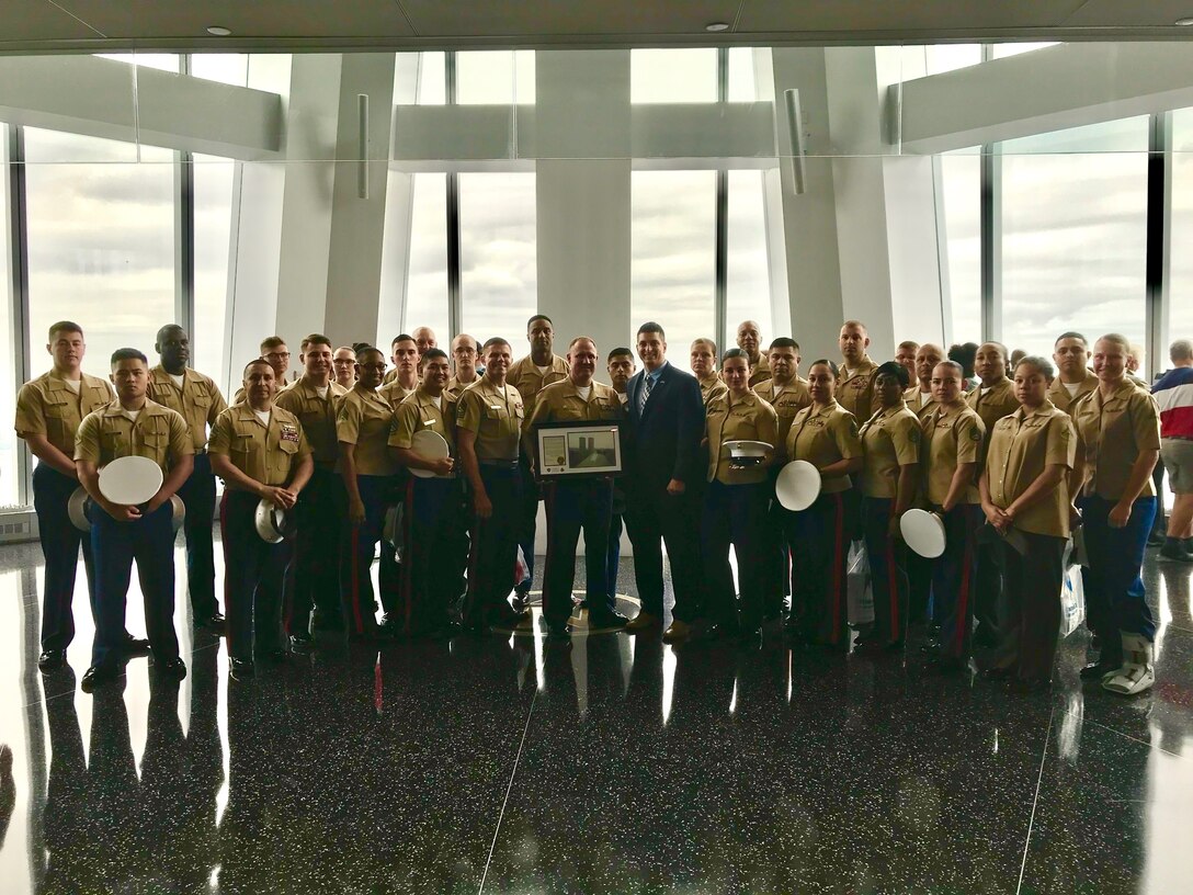 Joshua Maarleveld, detective with the Port Authority of New York and New Jersey, poses for a photo with Marines of the Marine Corps Recruiting Command inside One World Trade Center in New York City,  September 20, 2018. Maarleveld guided the Marines through the site and briefed them on the history of the attacks that took place in New York City on September 11, 2001. (Courtesy Photo)