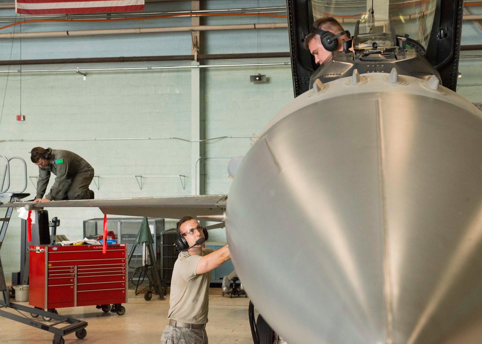 U.S. Air Force aircraft maintainers assigned to the 158th Fighter Wing, perform maintenance checks on Aircraft 328 during a phase inspection at the Vermont Air National Guard Base, August 1, 2018. Aircraft 328 was the last F-16 to undergo a phase inspection as the unit transitions to the F-35 Lightning II in fall of 2019. (U.S. Air National Guard photo by 2nd. Lt. Chelsea Clark)