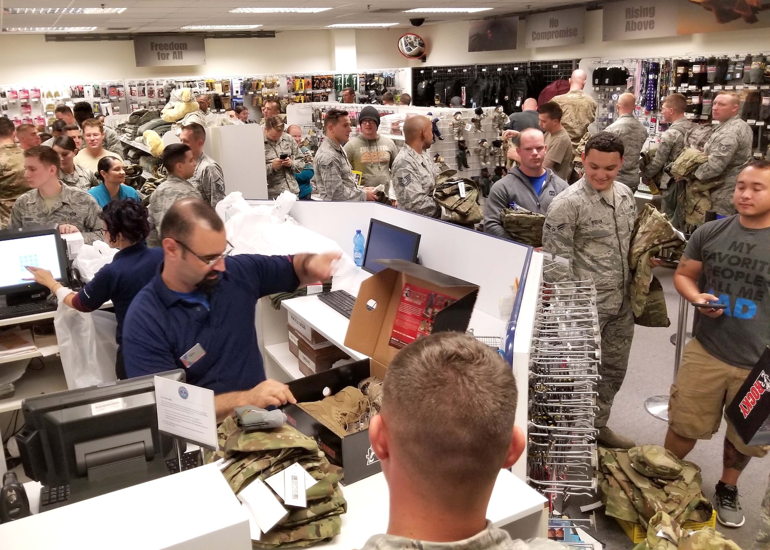 Airmen at Aviano Air Base, Italy filled the Army and Air Force Exchange Service sales store to purchase the Operational Camouflage Pattern utility uniform October 1, 2018. DLA Troop Support Clothing and Textiles worked with its Air Force counterparts and other key stakeholders since April to ensure more than 17,000 uniforms were delivered to five military clothing sales stores, including Aviano Air Base, Shaw Air Force Base, South Carolina, the Pentagon, Washington, D.C., Joint Base Charleston, South Carolina and MacDill AFB, Florida for the initial fielding.