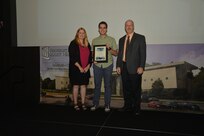 IMAGE: DAHLGREN, Va. (Sept. 21, 2018) – Christopher Lipscomb receives his certificate of achievement from Naval Surface Warfare Center Dahlgren Division (NSWCDD) Acting Chief of Staff Terri Gray and Acting Deputy Technical Director Chris Clifford at the 2018 NSWCDD Academic Recognition Ceremony.