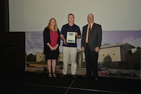 IMAGE: DAHLGREN, Va. (Sept. 21, 2018) – David Mcilvain receives his certificate of achievement from Naval Surface Warfare Center Dahlgren Division (NSWCDD) Acting Chief of Staff Terri Gray and Acting Deputy Technical Director Chris Clifford at the 2018 NSWCDD Academic Recognition Ceremony.