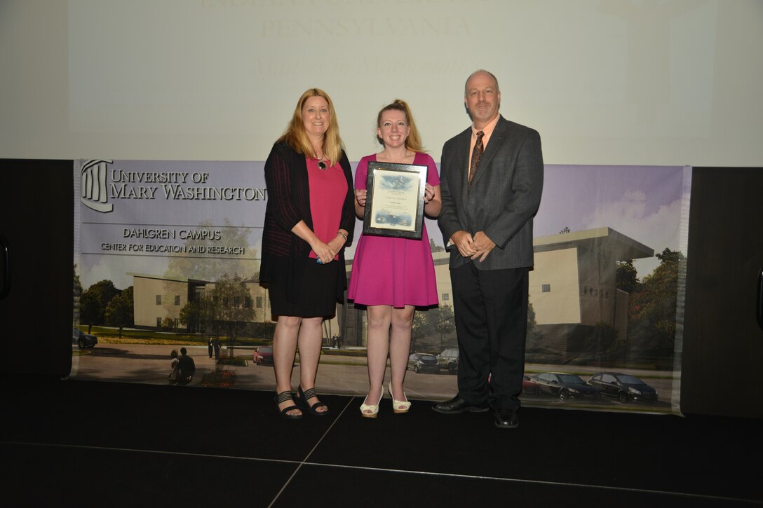 IMAGE: DAHLGREN, Va. (Sept. 21, 2018) – Jennifer Testa receives her certificate of achievement from Naval Surface Warfare Center Dahlgren Division (NSWCDD) Acting Chief of Staff Terri Gray and Acting Deputy Technical Director Chris Clifford at the 2018 NSWCDD Academic Recognition Ceremony.