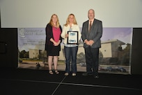 IMAGE: DAHLGREN, Va. (Sept. 21, 2018) – Kathleen Jones receives her certificate of achievement from Naval Surface Warfare Center Dahlgren Division (NSWCDD) Acting Chief of Staff Terri Gray and Acting Deputy Technical Director Chris Clifford at the 2018 NSWCDD Academic Recognition Ceremony.