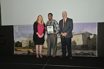 IMAGE: DAHLGREN, Va. (Sept. 21, 2018) – Gregory Blanche receives his certificate of achievement from Naval Surface Warfare Center Dahlgren Division (NSWCDD) Acting Chief of Staff Terri Gray and Acting Deputy Technical Director Chris Clifford at the 2018 NSWCDD Academic Recognition Ceremony.
