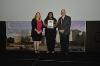 IMAGE: DAHLGREN, Va. (Sept. 21, 2018) – Quinnesha Staton receives her certificate of achievement from Naval Surface Warfare Center Dahlgren Division (NSWCDD) Acting Chief of Staff Terri Gray and Acting Deputy Technical Director Chris Clifford at the 2018 NSWCDD Academic Recognition Ceremony.
