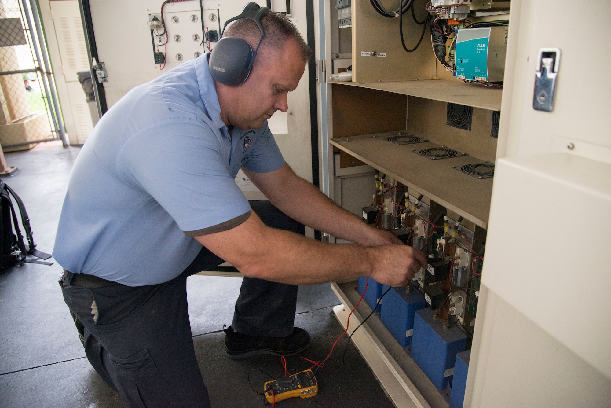 Gary Harris, 12th Flying Training Wing aerospace ground equipment mechanic, checks equipment voltage during routine maintenance Aug. 28, 2018, at Joint Base San Antonio-Randolph, Texas. Harris is part of a team that inspects, tests and maintains ground equipment that supports aircraft maintenance and flying training operations.