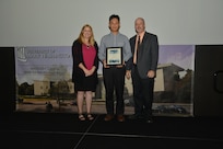 IMAGE: DAHLGREN, Va. (Sept. 21, 2018) – Nathan Kim receives his certificate of achievement from Naval Surface Warfare Center Dahlgren Division (NSWCDD) Acting Chief of Staff Terri Gray and Acting Deputy Technical Director Chris Clifford at the 2018 NSWCDD Academic Recognition Ceremony.