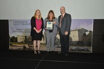 IMAGE: DAHLGREN, Va. (Sept. 21, 2018) – Cheryl Subacius receives her certificate of achievement from Naval Surface Warfare Center Dahlgren Division (NSWCDD) Acting Chief of Staff Terri Gray and Acting Deputy Technical Director Chris Clifford at the 2018 NSWCDD Academic Recognition Ceremony.