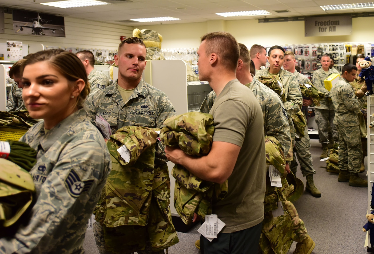 Airmen wait in line to purchase the Operational Camouflage Pattern uniform at Military Clothing Sales on Aviano Air Base Oct. 1, 2018.