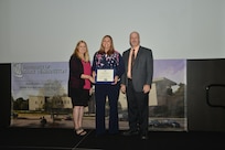 IMAGE: DAHLGREN, Va. (Sept. 21, 2018) – Doneen Phillips receives her certificate of appreciation from Naval Surface Warfare Center Dahlgren Division (NSWCDD) Acting Chief of Staff Terri Gray and Acting Deputy Technical Director Chris Clifford at the 2018 NSWCDD Academic Recognition Ceremony.