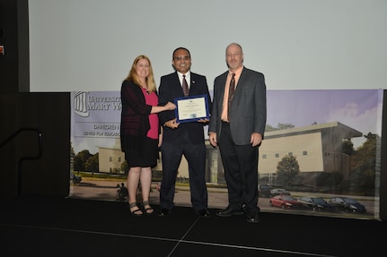 IMAGE: DAHLGREN, Va. (Sept. 21, 2018) – Gaurang Dave receives his certificate of appreciation from Naval Surface Warfare Center Dahlgren Division (NSWCDD) Acting Chief of Staff Terri Gray and Acting Deputy Technical Director Chris Clifford at the 2018 NSWCDD Academic Recognition Ceremony.