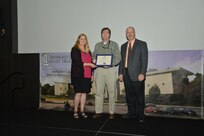 IMAGE: DAHLGREN, Va. (Sept. 21, 2018) – Michael Kelly receives his certificate of appreciation from Naval Surface Warfare Center Dahlgren Division (NSWCDD) Acting Chief of Staff Terri Gray and Acting Deputy Technical Director Chris Clifford at the 2018 NSWCDD Academic Recognition Ceremony.