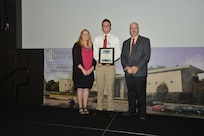 IMAGE: DAHLGREN, Va. (Sept. 21, 2018) – Zachary Yee receives his certificate of achievement from Naval Surface Warfare Center Dahlgren Division (NSWCDD) Acting Chief of Staff Terri Gray and Acting Deputy Technical Director Chris Clifford at the 2018 NSWCDD Academic Recognition Ceremony.