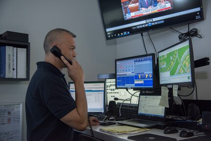 Humberto Sarabia Jr., lead dispatcher for the 502nd Civil Engineer Group/Fire Department, responds to a 911 emergency call on Joint Base San Antonio-Randolph, Texas, Oct. 3, 2018. 911 dispatchers on base work out of the Emergency Control Center in building 237. (U.S. Air Force photo by Airman Shelby Pruitt)