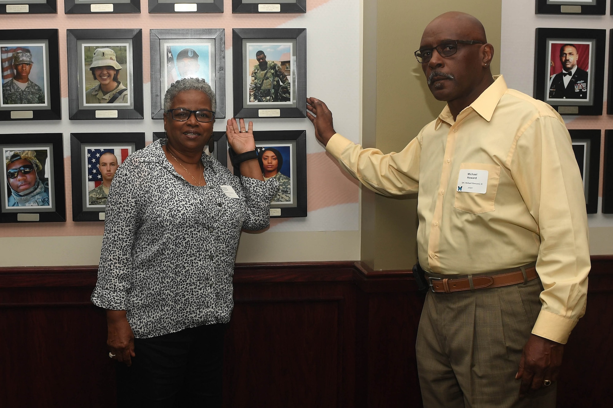 Michael and Vanessa Howard, parents of deceased U.S. Army Spc. Michael Howard II, take a photo with their son’s portrait during the Gold Star Mother’s Day ceremony at Joint Base Langley-Eustis, Virginia, Sept. 30, 2018. Howard II served five years in the Army, deployed to Kosovo and Iraq, and was preparing for another deployment when he was killed in a motorcycle accident in Columbus, Georgia in November 2004. (U.S. Air Force photo by Senior Airman Derek Seifert)