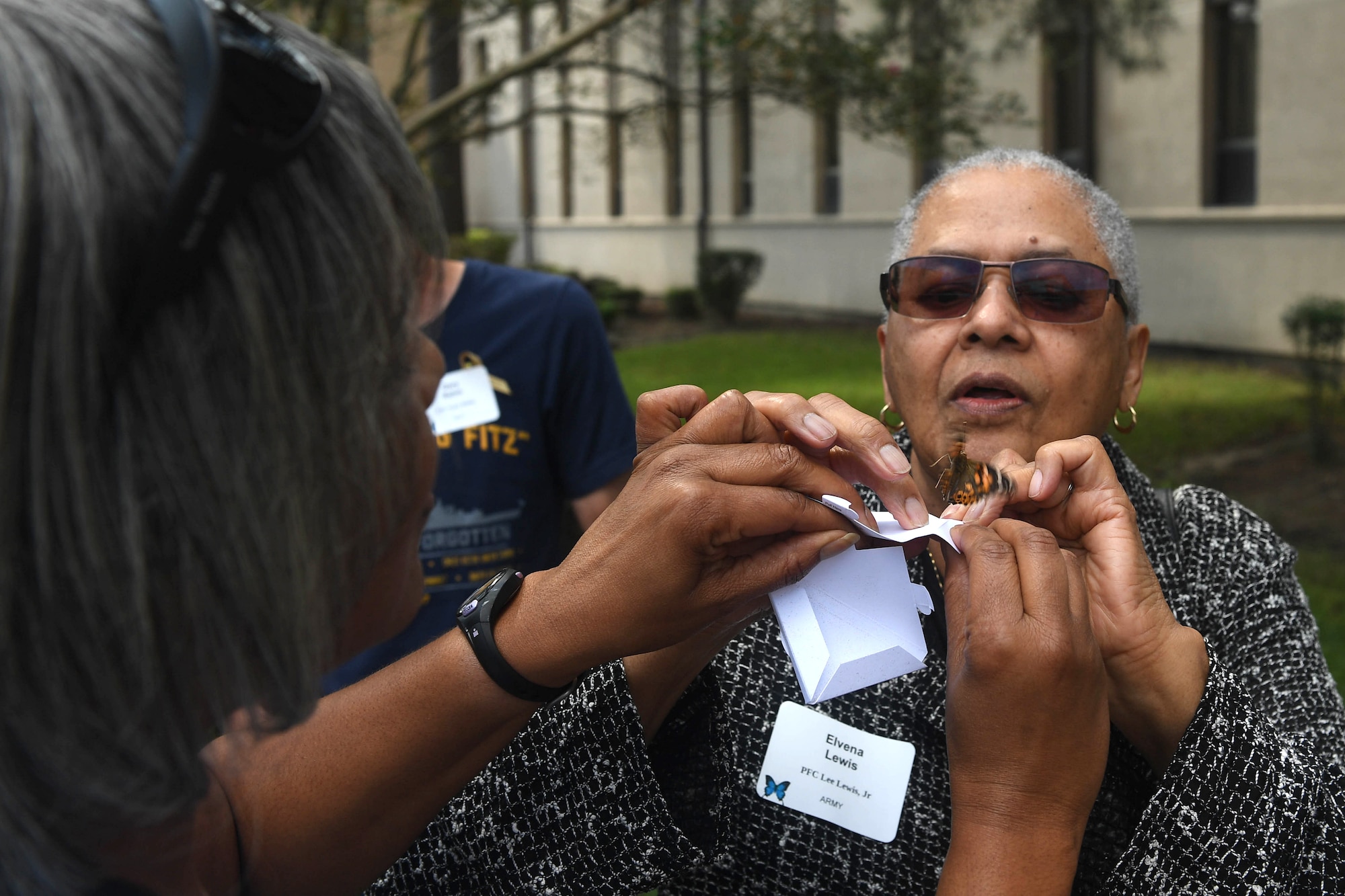 Elvena Lewis, mother of deceased U.S. Army Pfc. Lee Lewis Jr., releases a butterfly during the Gold Star Mother’s Day event at Joint Base Langley-Eustis, Virginia, Sept. 30, 2018. Releasing butterflies symbolizes endurance and how Gold Star families had to embrace change and the search of hope. (U.S. Air Force photo by Senior Airman Derek Seifert)