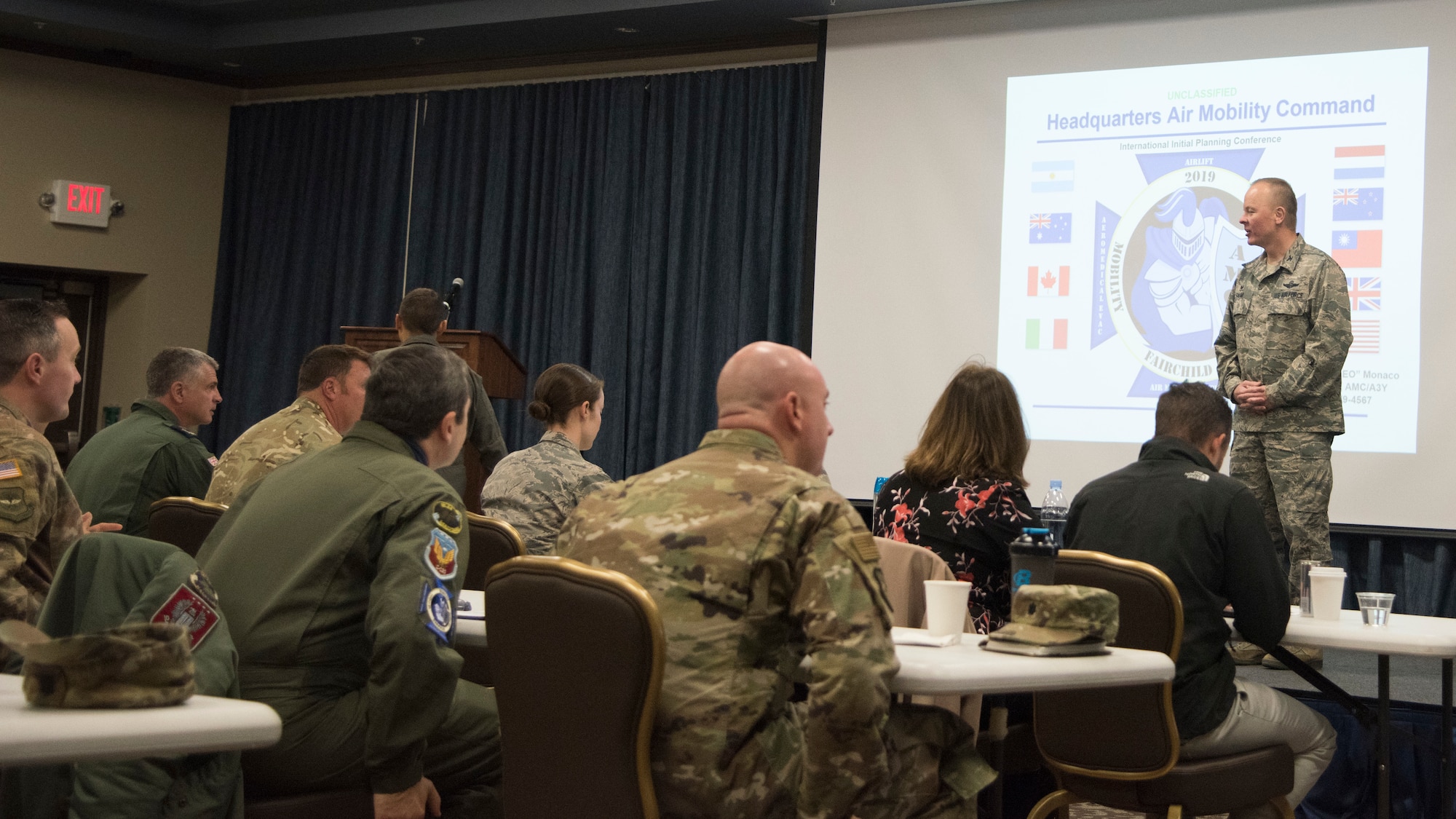 U.S. Air Force Col. Derek Salmi, 92nd Air Refueling Wing commander, greets attendees of the Mobility Guardian 2019 International Planning Conference held at Fairchild Air Force Base, Washington, Sept. 18, 2018. The conference served as a brainstorming session for contexts to increase teamwork between partnered militaries during the exercise by joining forces to accomplish critical training goals so allied forces can integrate seamlessly at a moment’s notice. (U.S. Air Force photo/Senior Airman Ryan Lackey)