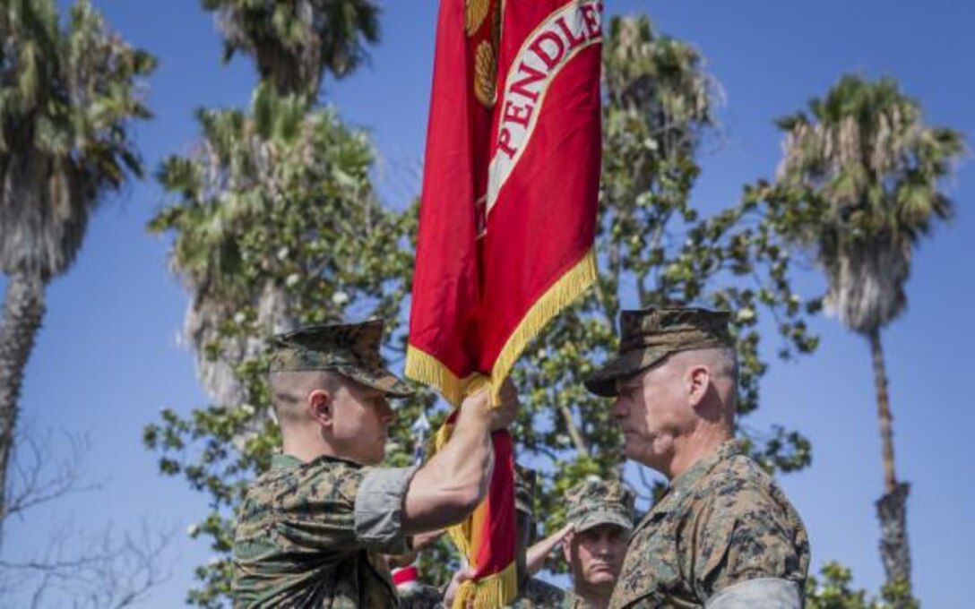 Colonel Richard T. Anderson, left, takes the organizational standard as he relieves Colonel Ian R. Clark as the Commanding Officer of Marine Corps Air Station Camp Pendleton. Colonel Clark served as the Commanding Officer of MCAS Camp Pendleton for three years before turning over the command to Colonel Anderson. Colonel Andersobn served as the Commanding Officer to II Marine Expeditionary Force, Expeditionary Operations Training Group for two years prior to taking command at MCAS Camp Pendleton.