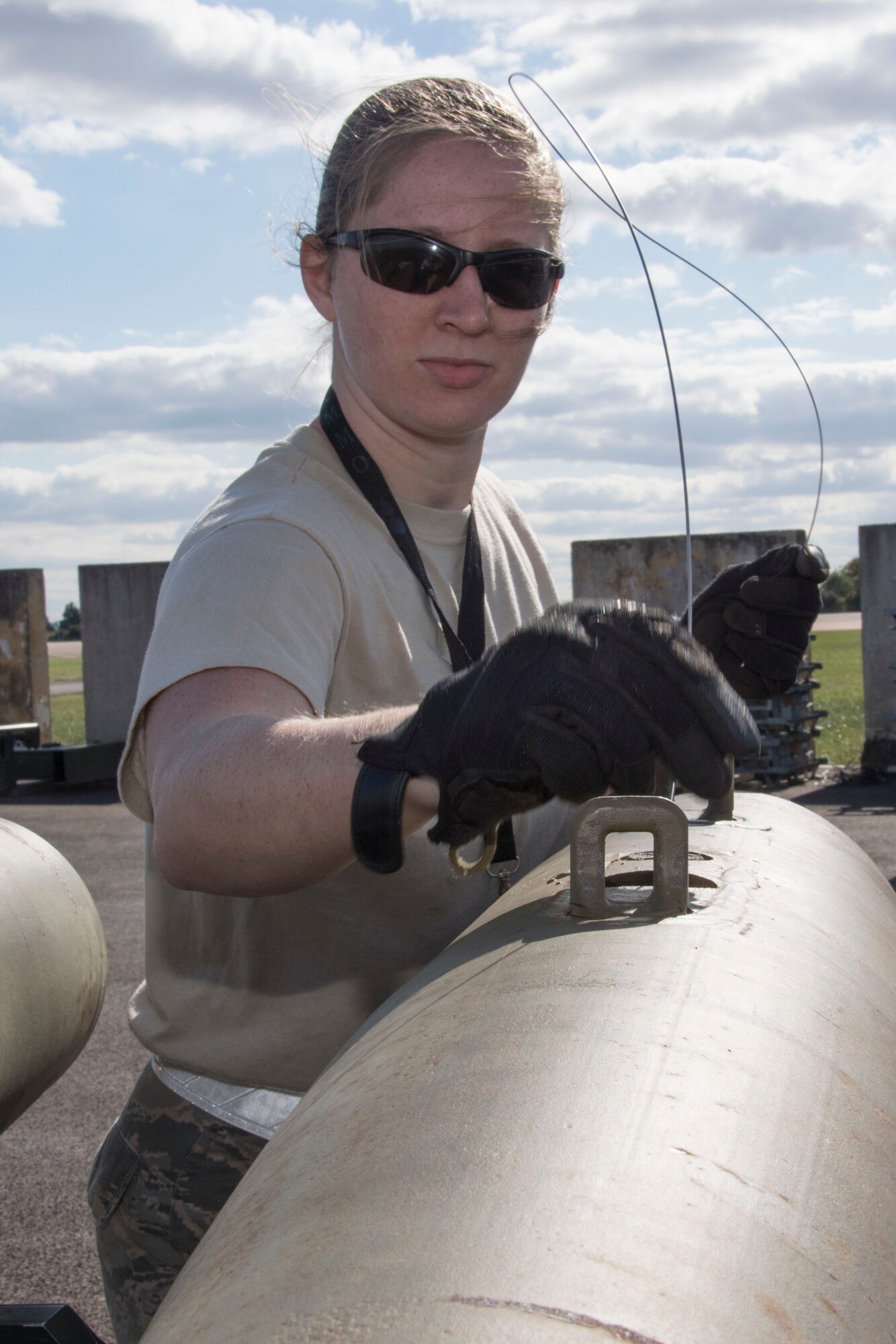 Staff Sgt. Ashley Johnson, 307th Maintenance Squadron munitions technician, prepares a munition at RAF Fairford, United Kingdom, Sept. 8, 2018.  Citizen Reserve Airmen of the 307th Maintenance Squadron and their active duty counterparts from the 2nd Bomb Wing worked together in support of the bomber task force rotating through the base.  (U.S. Air Force photo by Master Sgt. Ted Daigle/released)