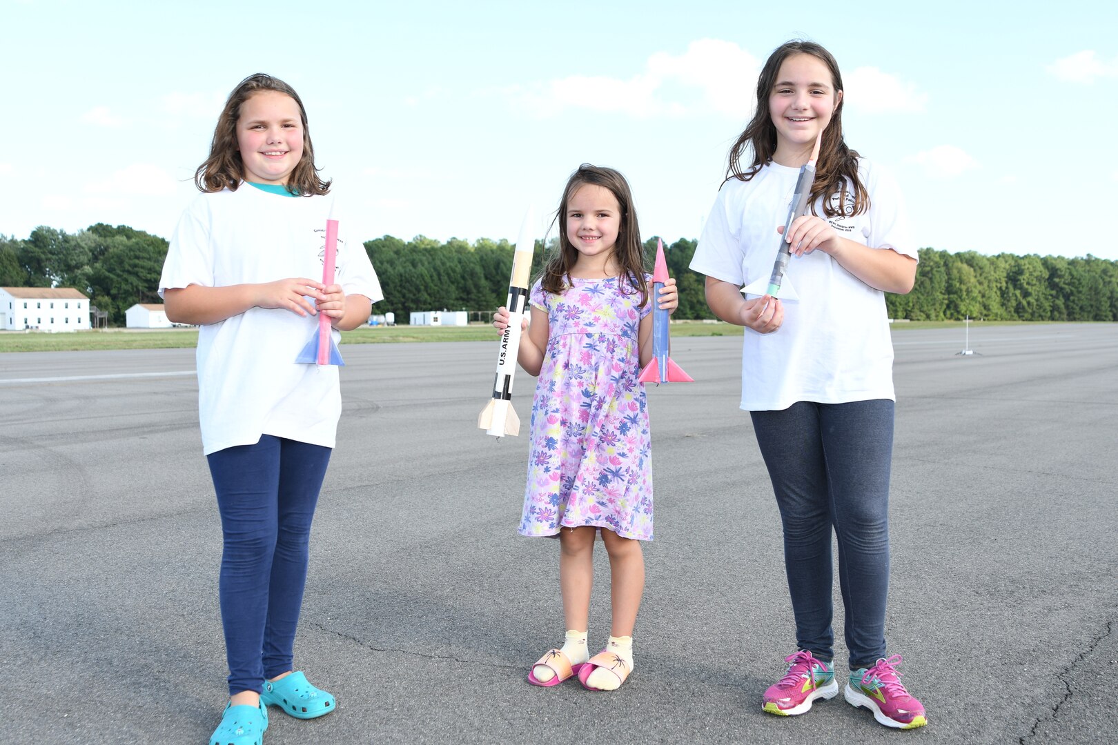 IMAGE: Centennial Rocket Competition participants with their rockets.