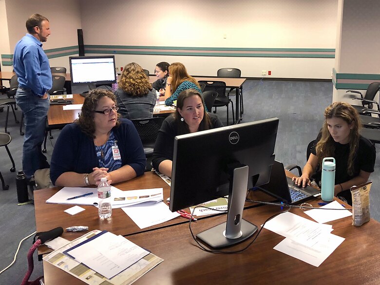 U.S. Army Corps of Engineers Sacramento District employees join representatives from California Department of Water Resources, Natural Resource Conservation Service, and other USACE offices in a "Serious Gaming" event called a Multi-Hazard Tournament on Sept. 26, 2018, in Sacramento.