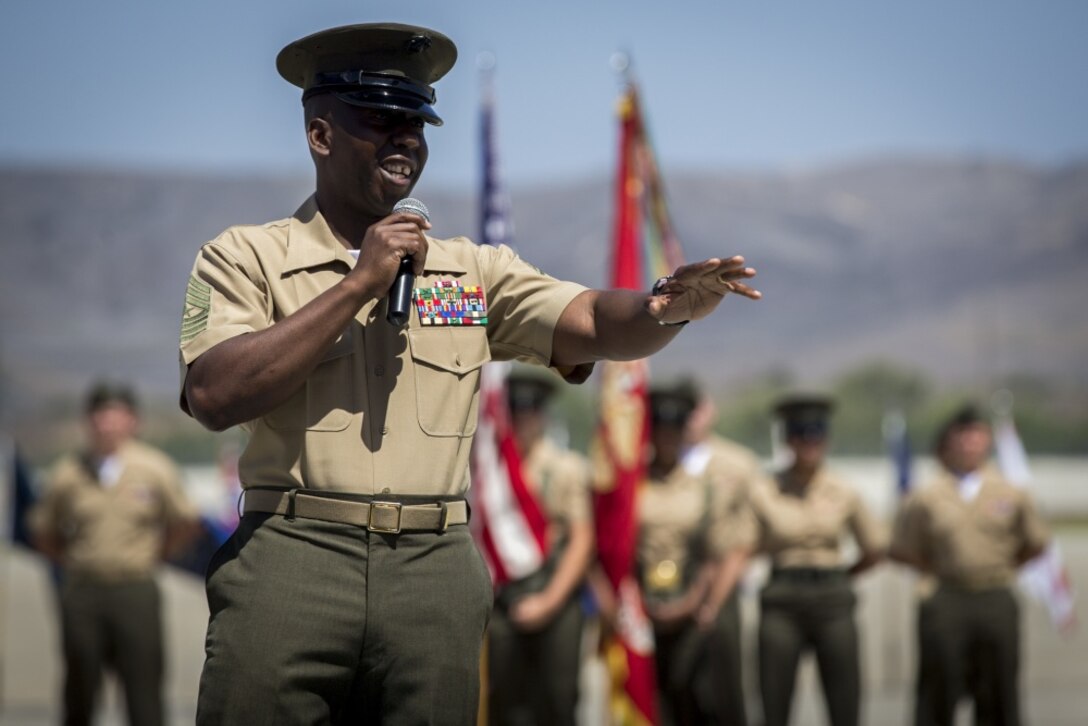 Sergeant Major Campbell gives a speech during the relief and appointment ceremony on 11 June 2018