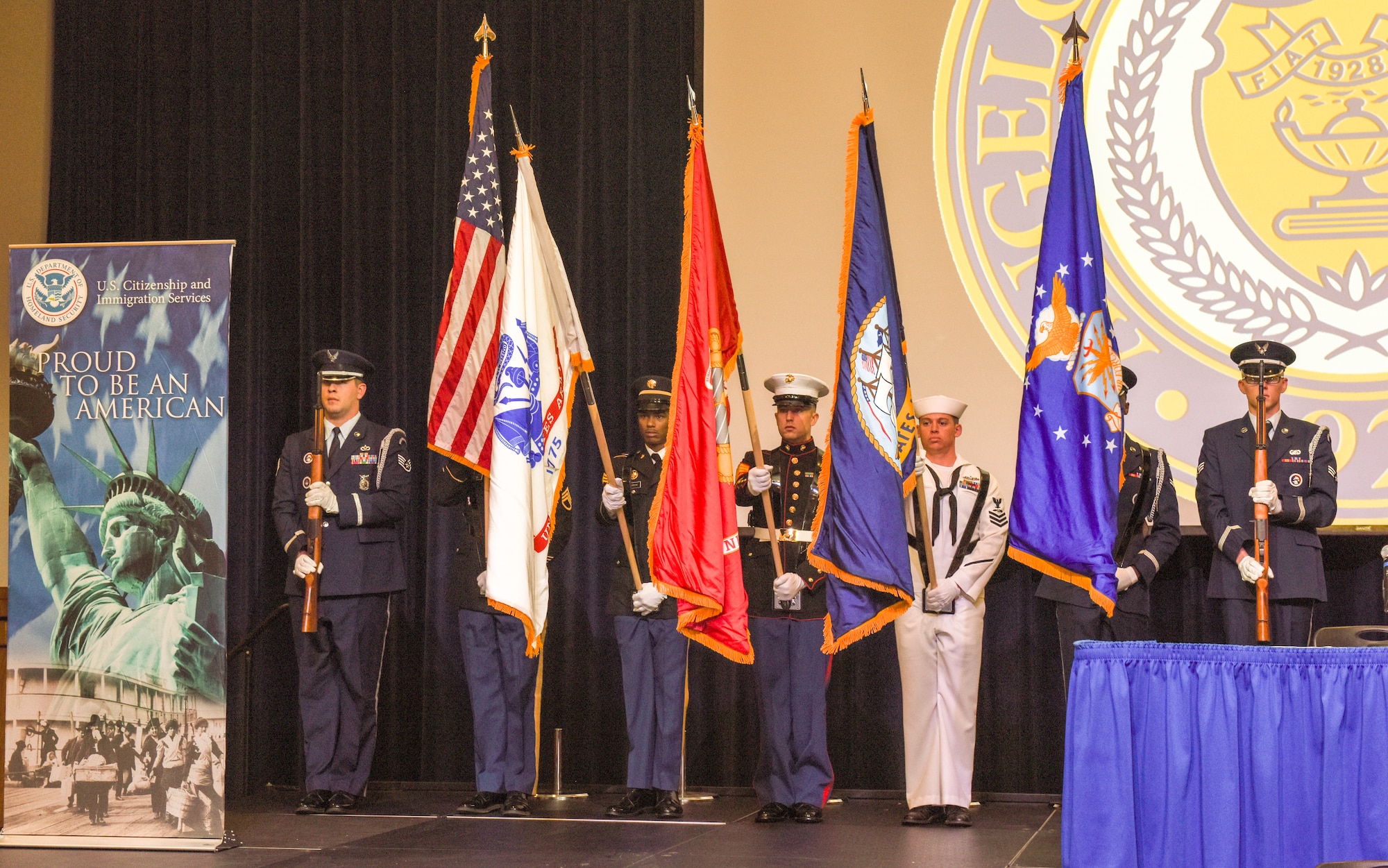 Members of the Joint Service Color Guard perform during the naturalization ceremony held at the CJ Davidson Center on Angelo State University, San Angelo, Texas, Sept. 25, 2018. Both the JSCG and the Patriotic Blue performed for the ceremony. (U.S. Air Force photo by Aryn Lockhart/Released)