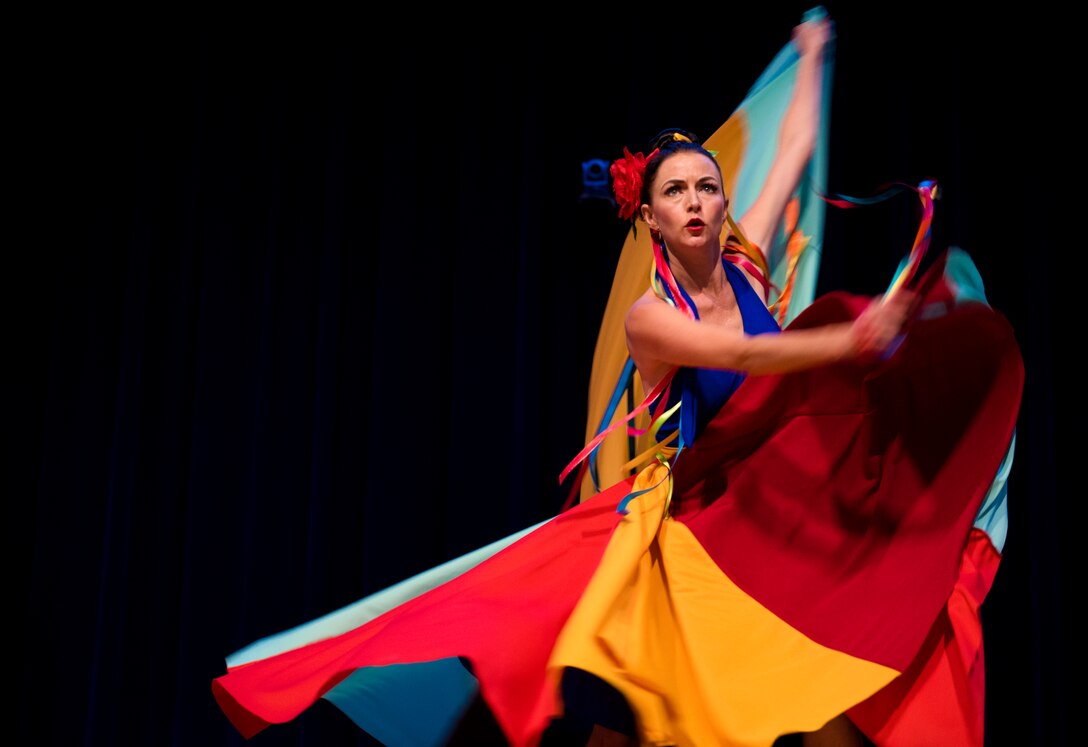 A performer from the Latin Ballet of Virginia dances during the National Hispanic Heritage Month ceremony at Joint Base Langley-Eustis, Virginia, Oct. 4, 2018.