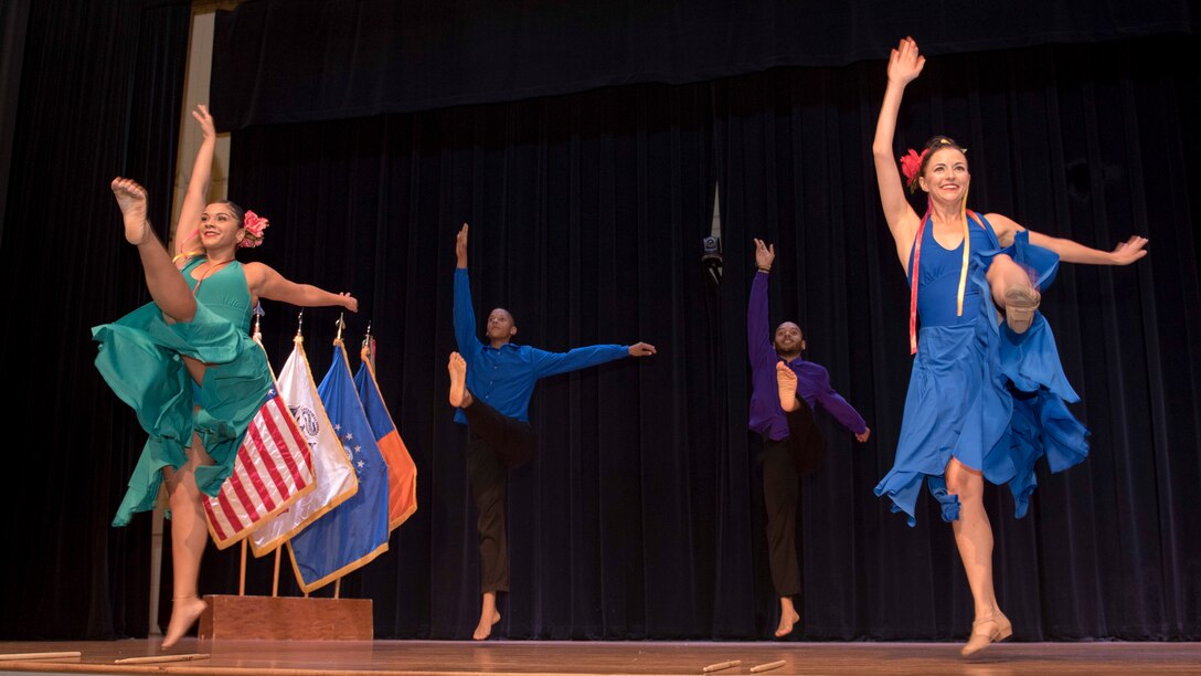 Performers from the Latin Ballet of Virginia dance during the National Hispanic Heritage Month ceremony at Joint Base Langley-Eustis, Virginia, Oct. 4, 2018.
