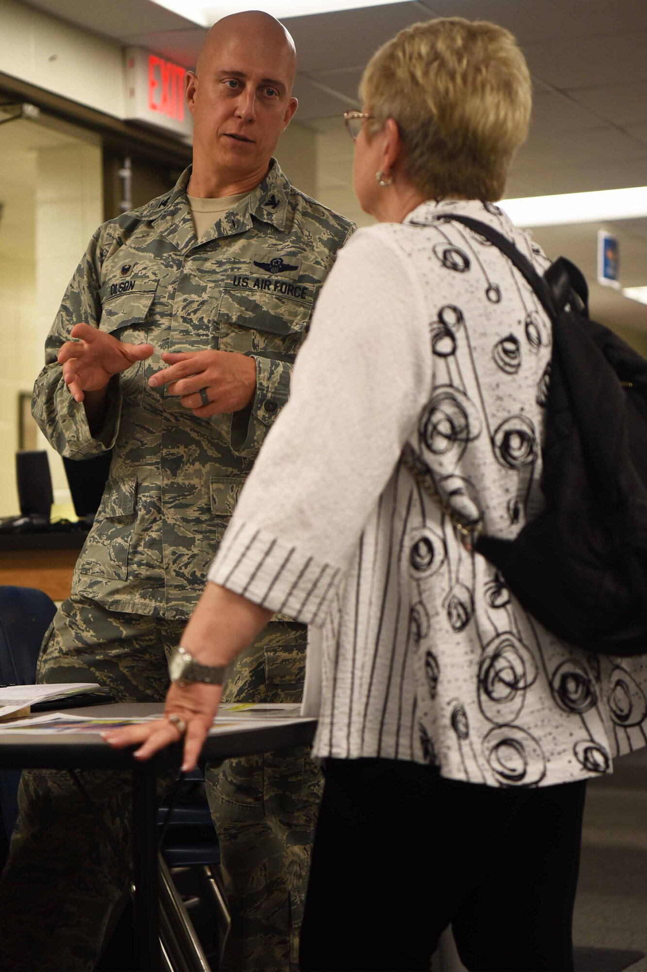Col. Josh Olson, 22nd Air Refueling Wing commander, discusses plans for Science, Technology, Engineering and Mathematics program with Dr. Sheree Utash, Wichita State University Tech. president Oct. 2, 2018 during a STARBASE tour at McConnell Air Force Base, Kansas. STARBASE gives schools a field trip location to teach students about STEM.