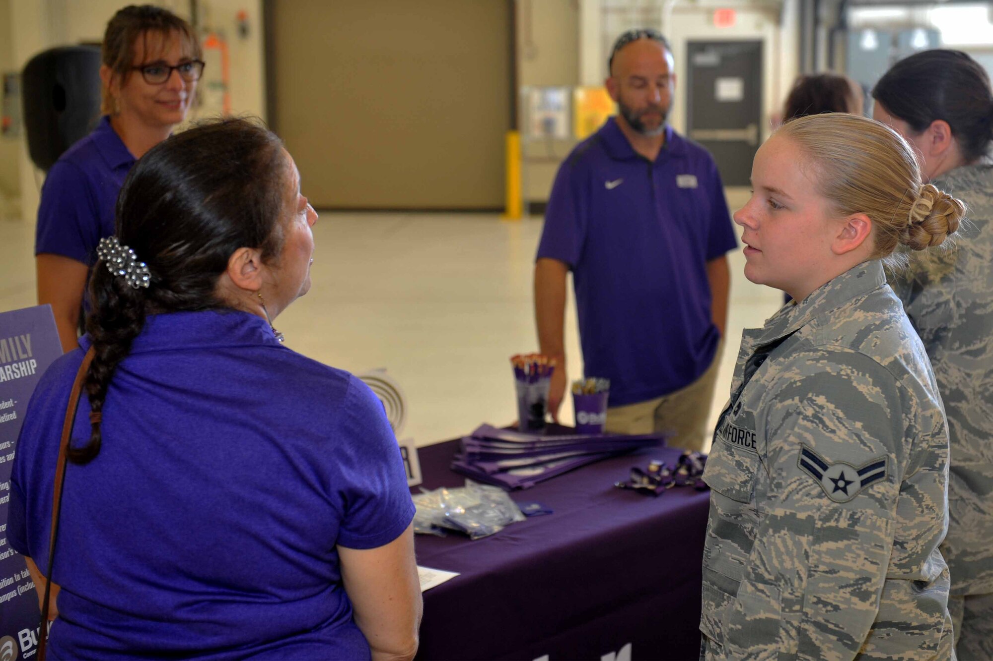 Members of Butler Community College discuss education opportunities with Airmen during the education fair Oct. 2, 2018, at McConnell Air Force Base, Kansas. BCC offers many different courses for Airmen to take both online and in person.