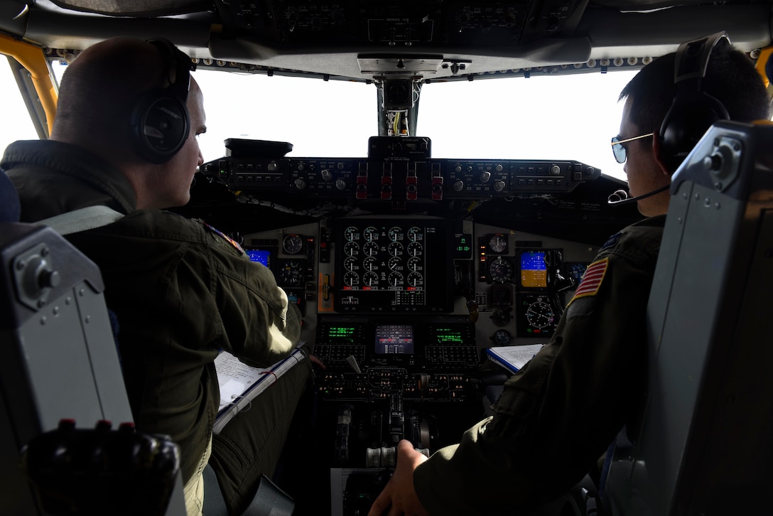 Lt. Col. Travis Christiensen (left) and Capt. Joey Springfield (right), 384th Air Refueling Squadron KC-135 Stratotanker pilots, perform pre-flight inspections at Farichild Air Force Base, Washington, Oct. 3, 2018. Airmen from Farichild's 384th ARS supported the KC-46A Pegasus during a training operation with the B-52 Stratofortress. (U.S. Air Force photo/Airman 1st Class Lawrence Sena)