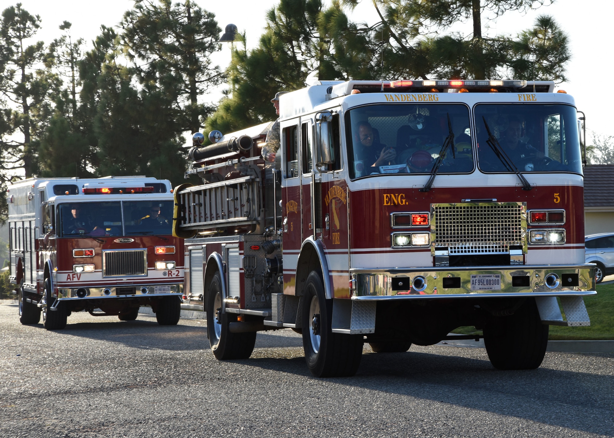 Fire trucks drive by Oct. 13, 2017, on Vandenberg Air Force Base, Calif. The drive was part of Fire Prevention Week.