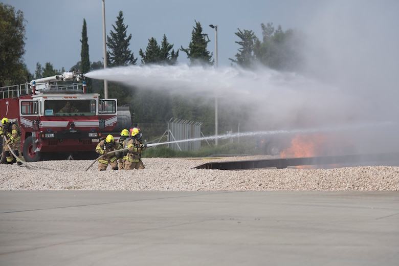 The 39th Civil Engineer Squadron put out a simulated aircraft fire at Incirlik Air Base, Turkey, Aug. 7, 2018.