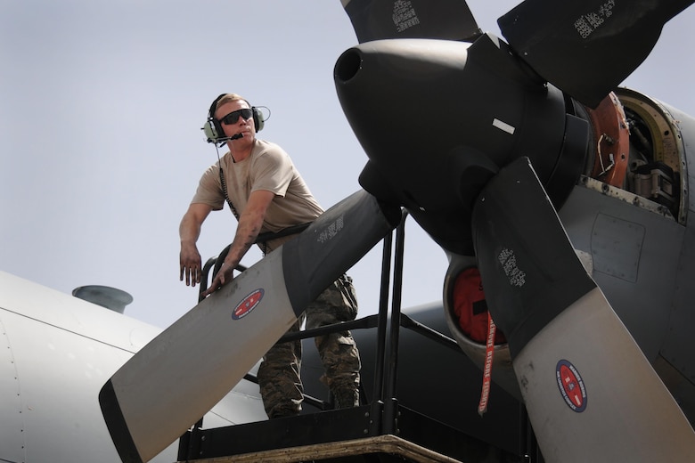 Senior Airman Jeremy Putnam, a 94th Maintenance Squadron aerospace propulsion technician, performs maintenance on a C-130 in Amman, Jordan, in support of Exercise Eager Lion, May 15, 2016. (U.S. Air Force photo/Staff Sgt. Alan Abernethy)