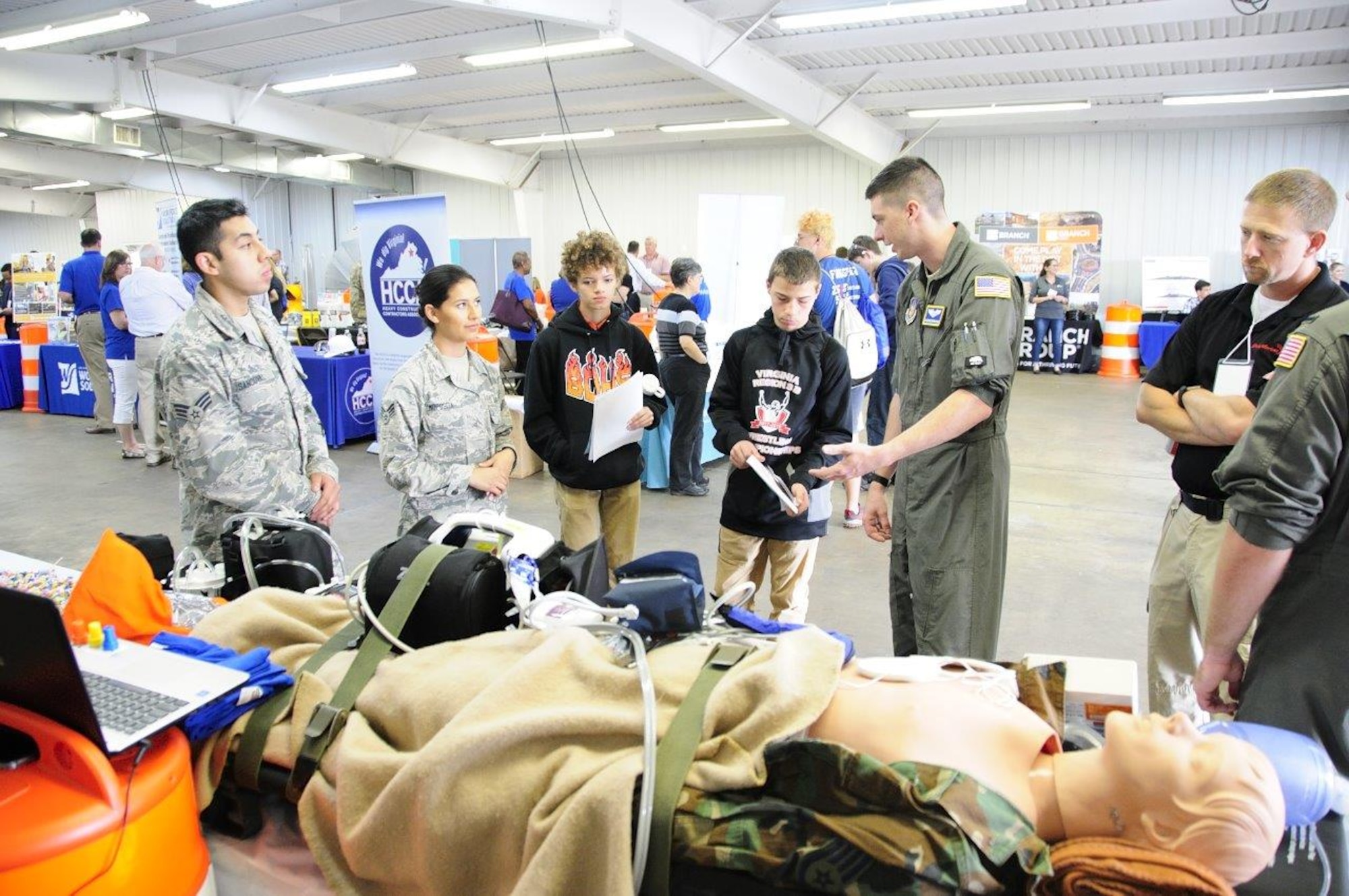 Flight nurses and medical technicians of the 459th Aeromedical Evacuation Squadron talk to students about their careers at the 14th Annual Northern Virginia Transportation Career Fair for High School Students in Manassas, Va. The career fair is part of a Federal Highway Administration initiative to promote the transportation industry and the careers it offers to America’s youth.