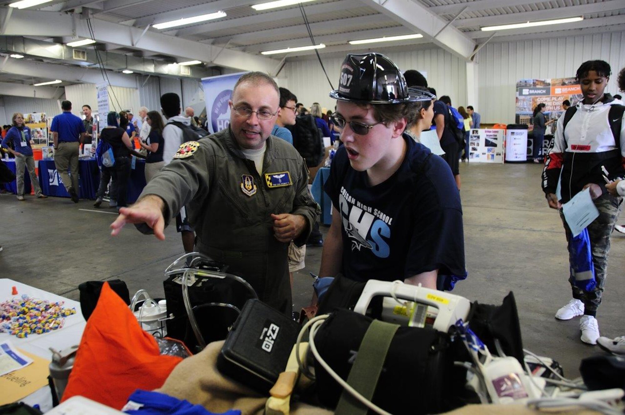 Flight nurses and medical technicians of the 459th Aeromedical Evacuation Squadron talk to students about their careers at the 14th Annual Northern Virginia Transportation Career Fair for High School Students in Manassas, Va. The career fair is part of a Federal Highway Administration initiative to promote the transportation industry and the careers it offers to America’s youth.