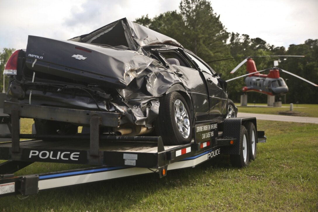 A static display of a wrecked car is displayed aboard Marine Corps Air Station Beaufort May 14. The display was set up to show the dangers of distracted and drunk driving
as well as to bring awareness to how Marines can stay safe during the “101 Days of Summer”.