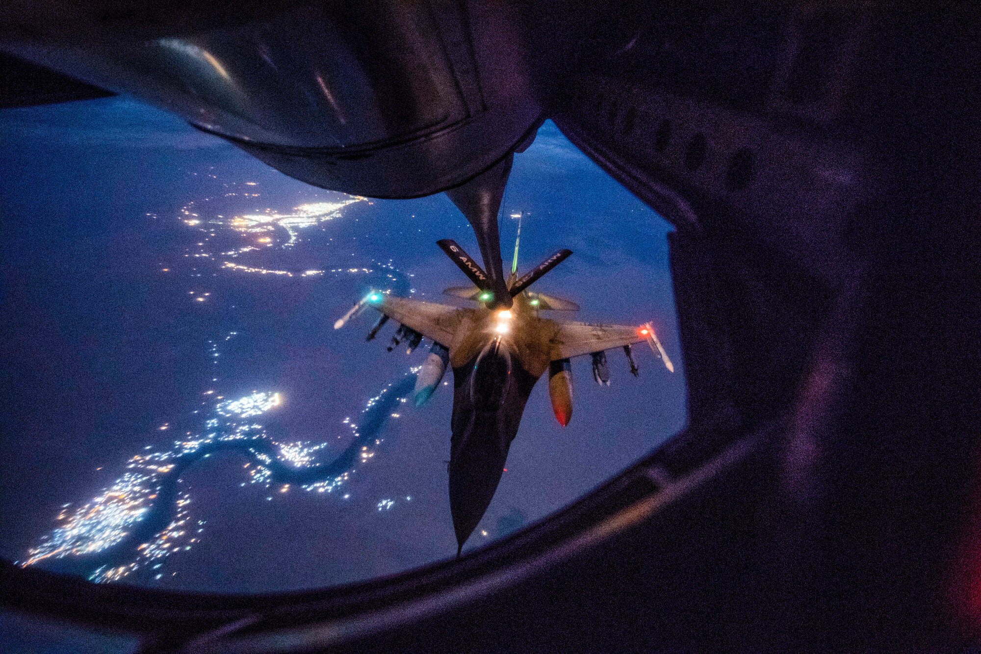 An Air Force F-16 Fighting Falcon, assigned to the 157th Expeditionary Fighter Squadron, receives in-flight fuel from a KC-135 Stratotanker during a mission in support of Operation Inherent Resolve over Iraq, Sept. 21, 2018. U.S. and Coalition aircraft provide unmatched combat capability in support of U.S. Central Command military objectives. (U.S. Air Force photo by Staff Sgt. Keith James)