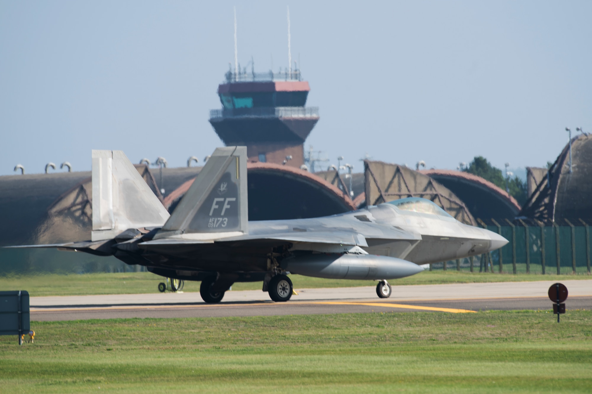 An F-22 Raptor assigned to the 1st Fighter Wing, Joint Base Langley-Eustis, Va., taxis down the flightline at Royal Air Force Lakenheath, England, Oct. 5, 2018. As the world’s premiere operational 5th-generation fighter, the Raptor’s unique combination of stealth, speed, agility and situational awareness combined with lethal long-range air-to-air and air-to-ground weaponry make it the best air dominance fighter in the world. (U.S. Air Force photo/Airman First Class Christopher Sparks)