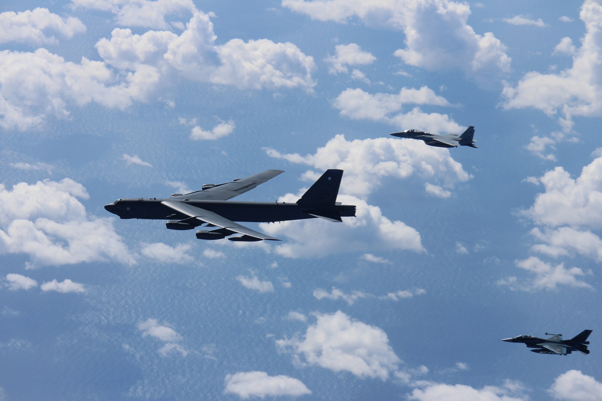 An Air Force B-52H Stratofortress bomber and a Japan Air Self-Defense Force F-15 and F-2 fighter execute a routine bilateral training mission over the East China Sea and the Sea of Japan, Sept. 26, 2018. This mission was flown in support of U.S. Indo-Pacific Command’s Continuous Bomber Presence operations, which are key to improving combined interoperability, tactical skills and relationships. (Courtesy photo)