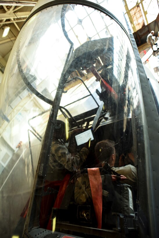 Electrical and environmental systems apprentice course Airmen replace components on an F-15 Eagle.