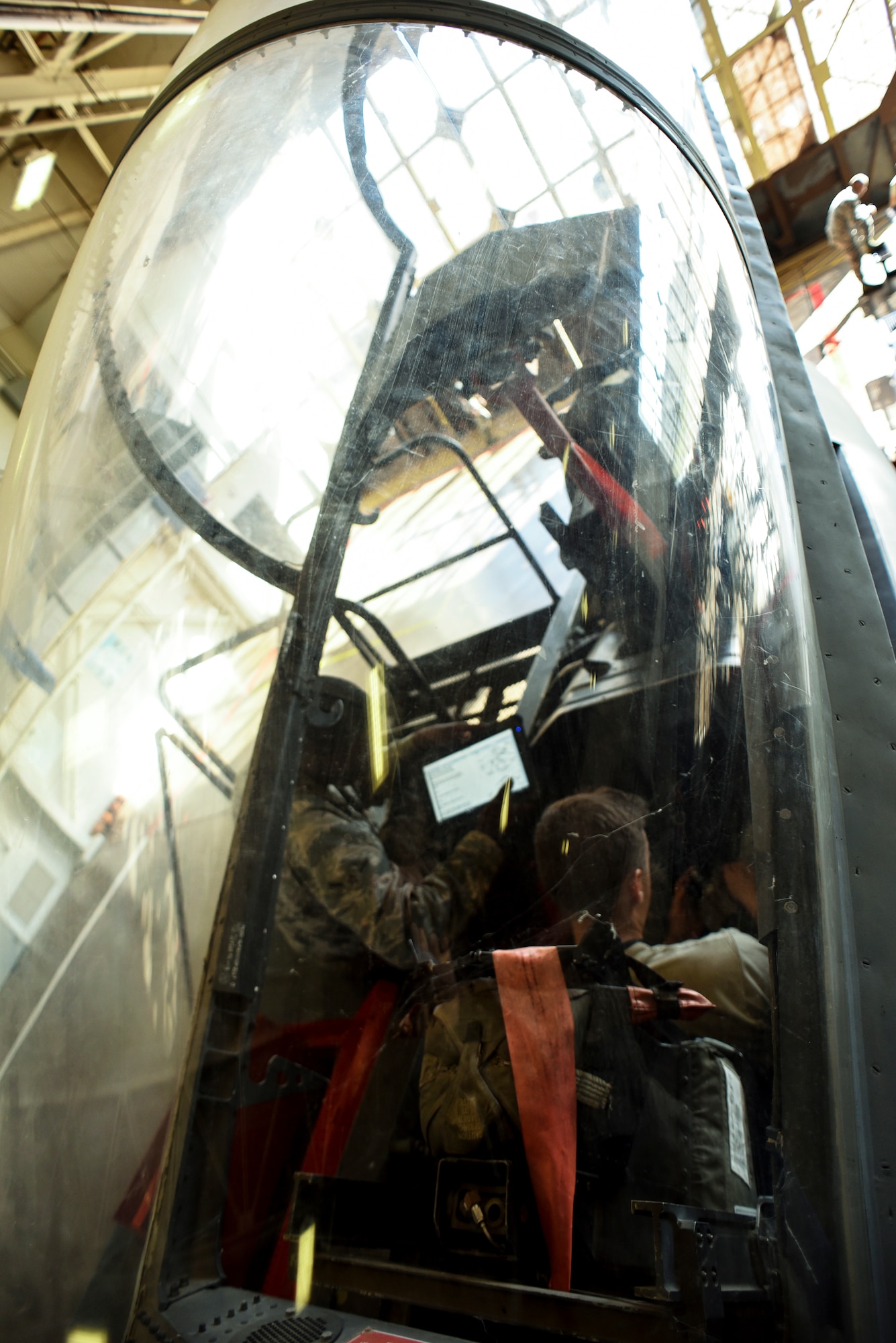 Electrical and environmental systems apprentice course Airmen replace components on an F-15 Eagle.